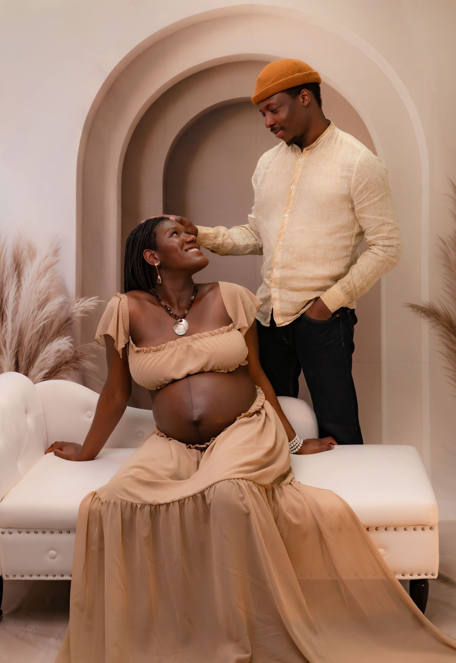 couple posing for maternity photography at gorilla studio