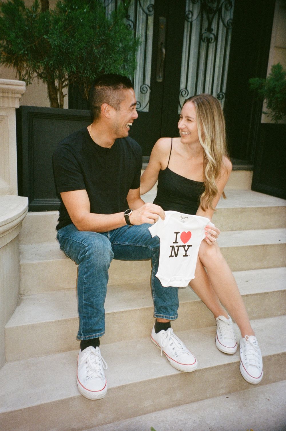 Lifestyle pregnancy photography in NYC capturing authentic family connection