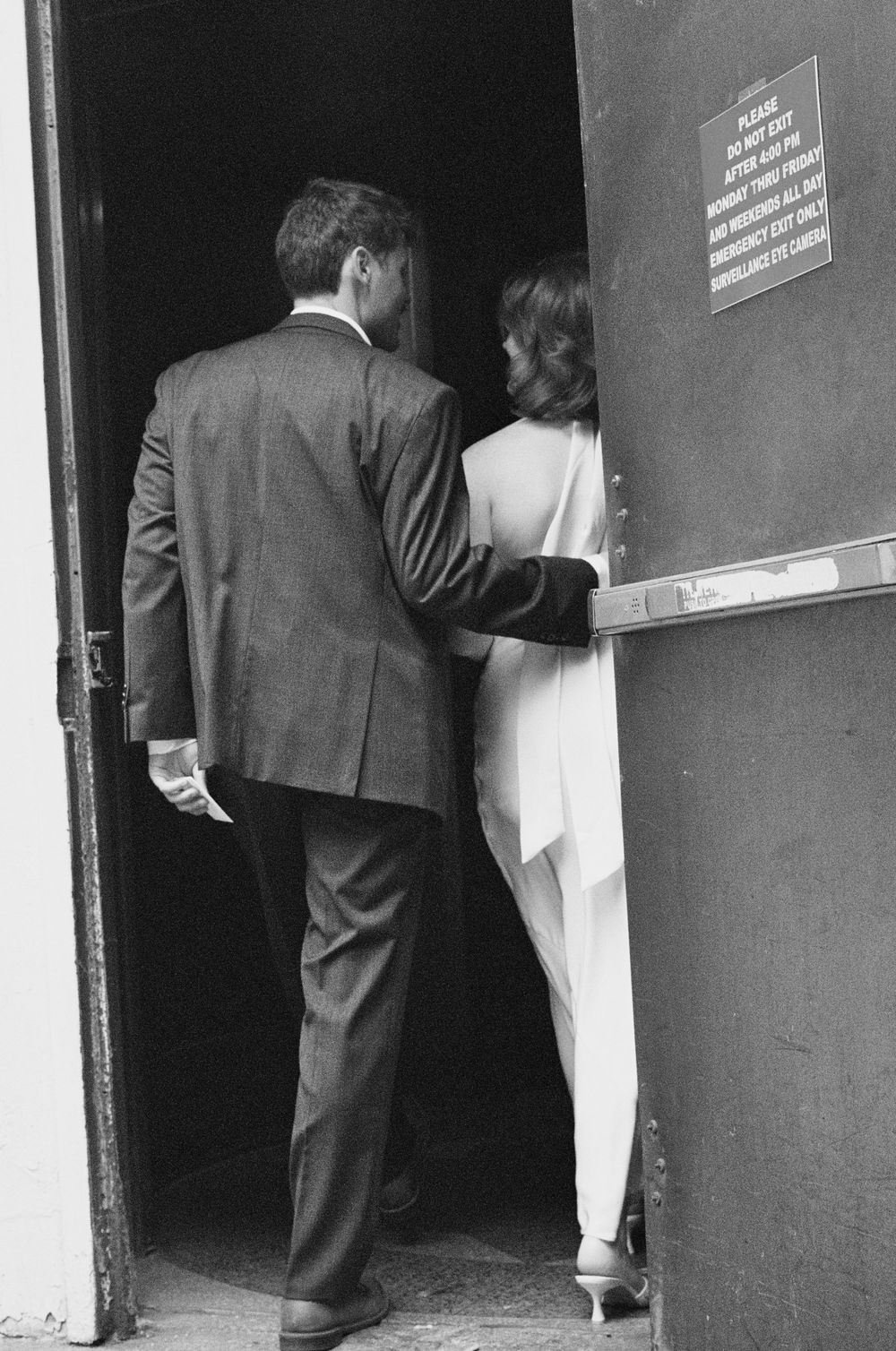 Editorial elopement photography in Manhattan combining documentary storytelling with a romantic film aesthetic