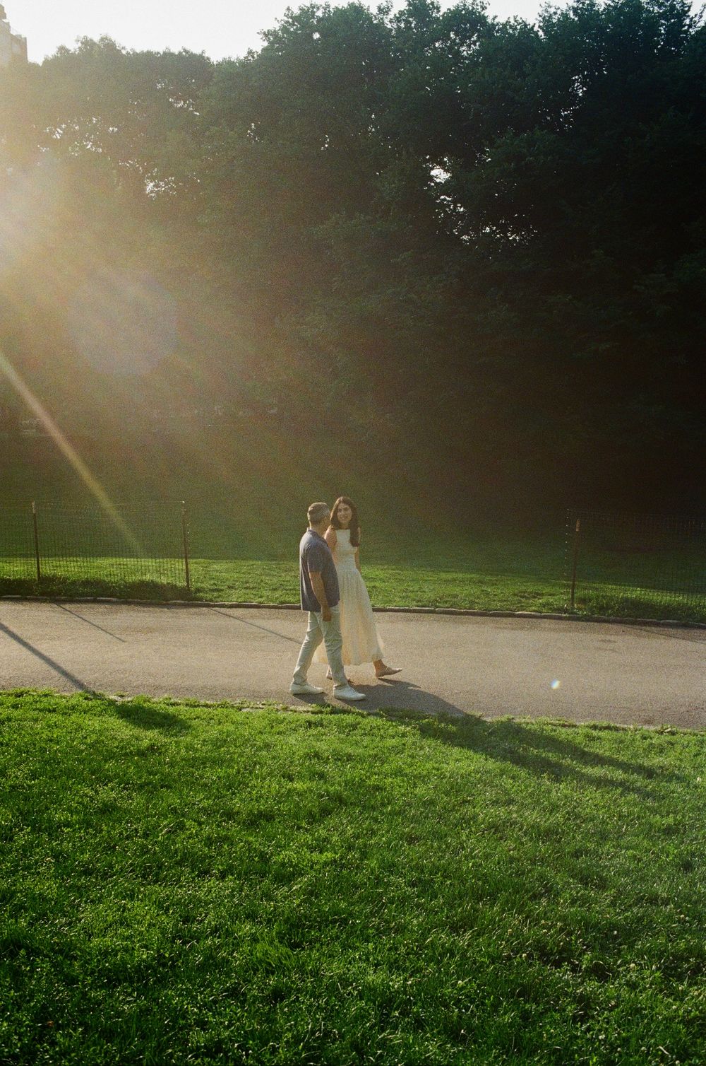 Central Park engagement photography in New York City featuring a romantic couple photographed on 35mm film