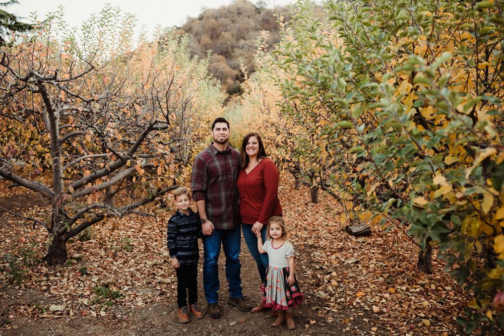 A series of fall family portrait photos taken outdoors with autumn foliage and golden leaves in the background.