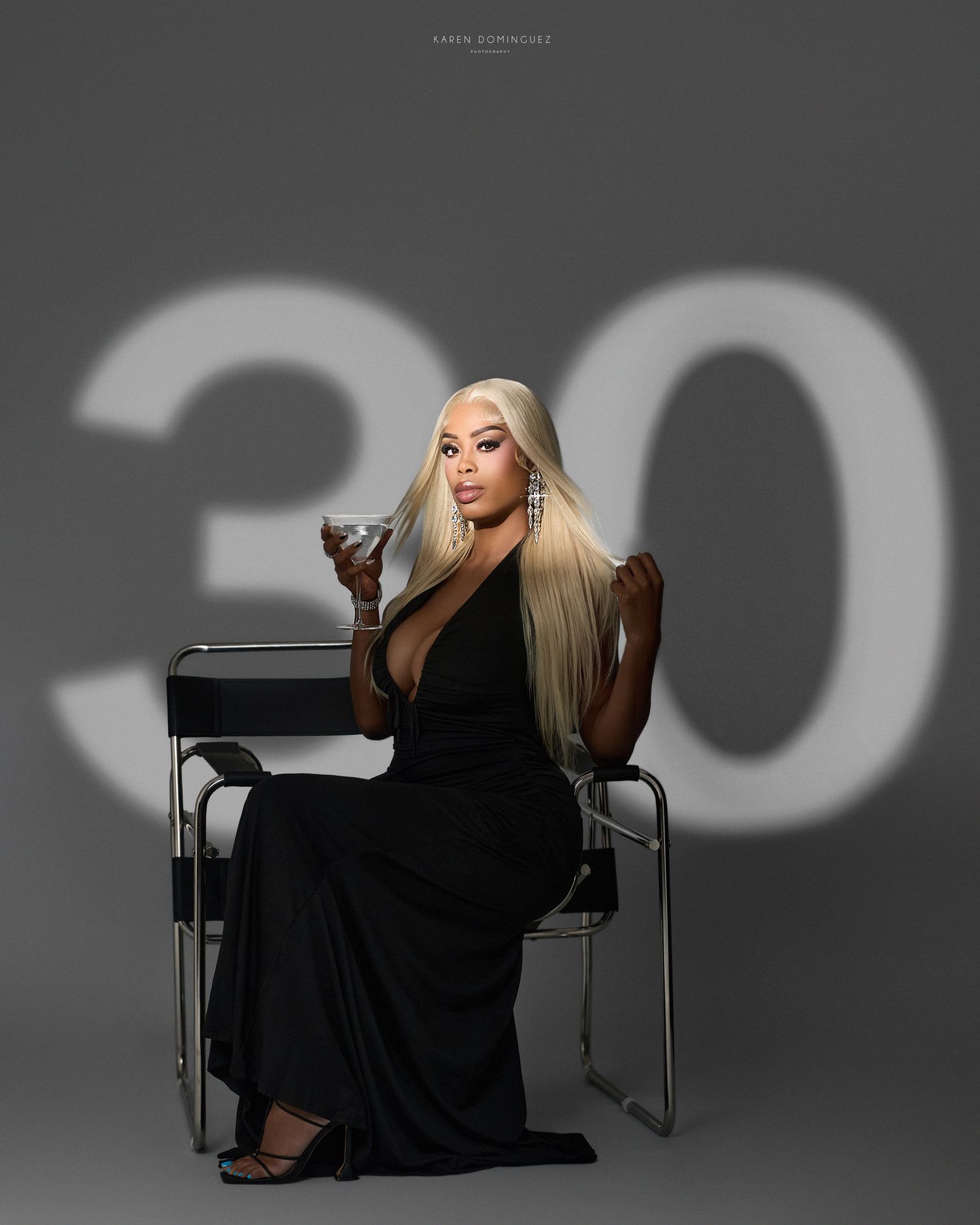 Artistic black and white photo series featuring dramatic poses with silver number 35 balloons in moody lighting.