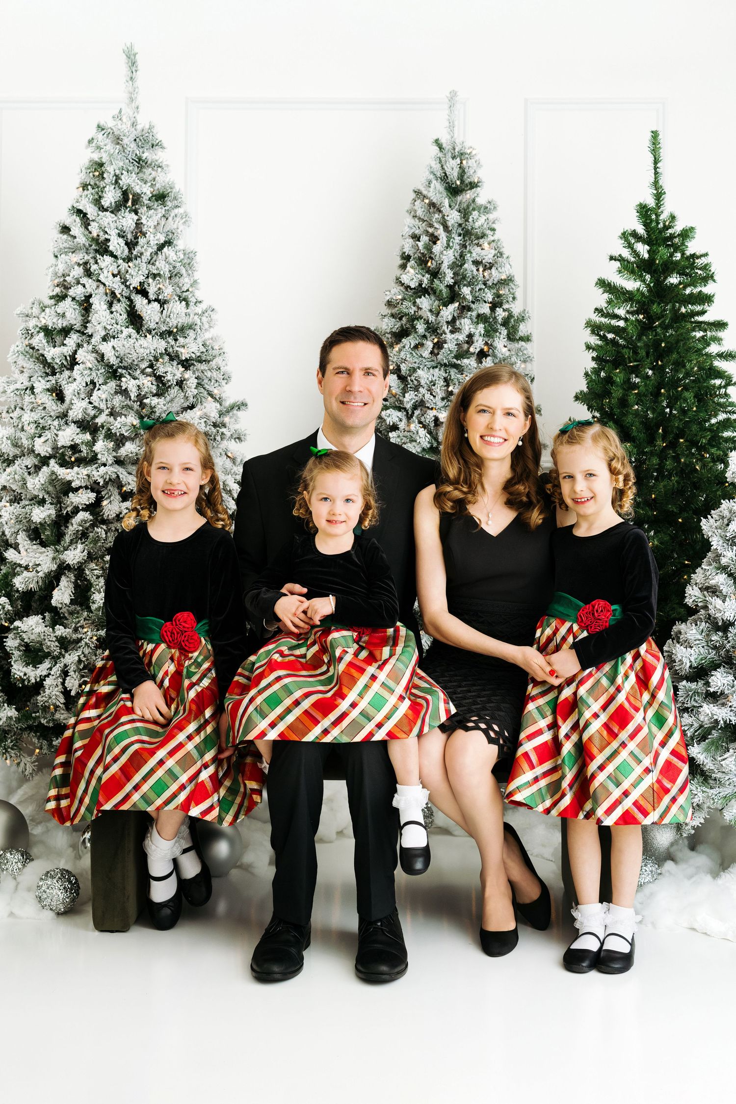 Snowy Chic Holiday Minis studio setup with modern velvet bench and Christmas décor in Houston photo Studio