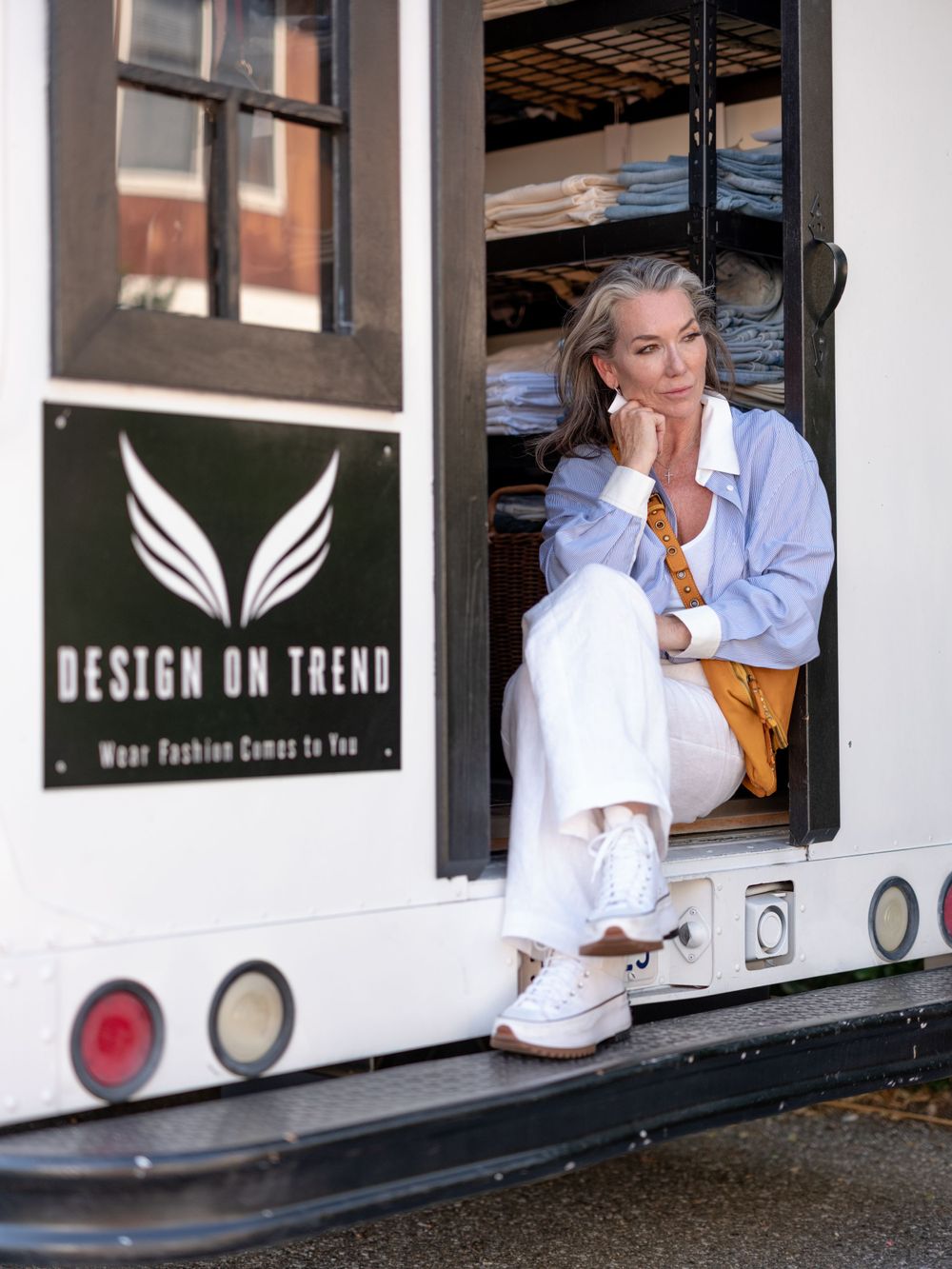 Design on Trend boutique storefront featuring casual spring fashion and relaxed loungewear styling.