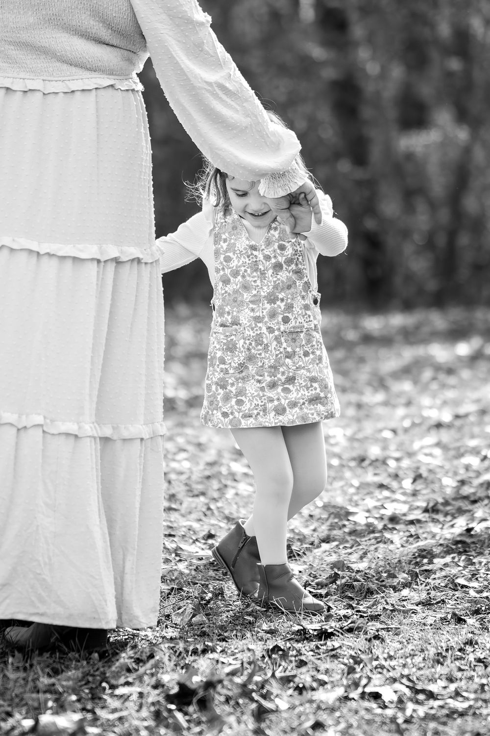 3 year old girl photographed by Nashville photographer dancing with her mom