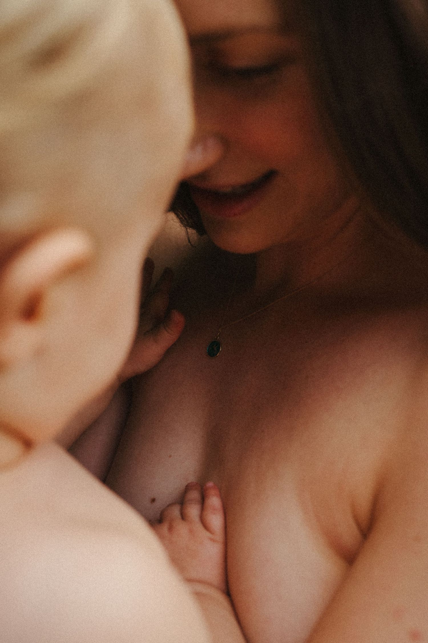 Soft focus intimate portraits in warm lighting showing gentle expressions.