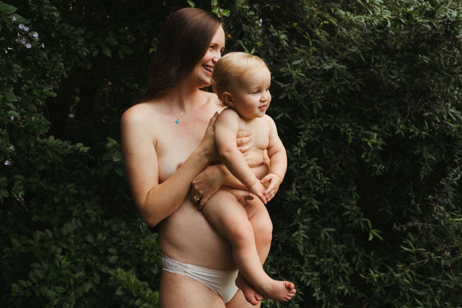 A series of tender moments captured between parent and child in a lush outdoor setting.
