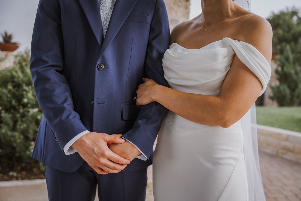 A close-up shot of a couple during their first look wedding moment.