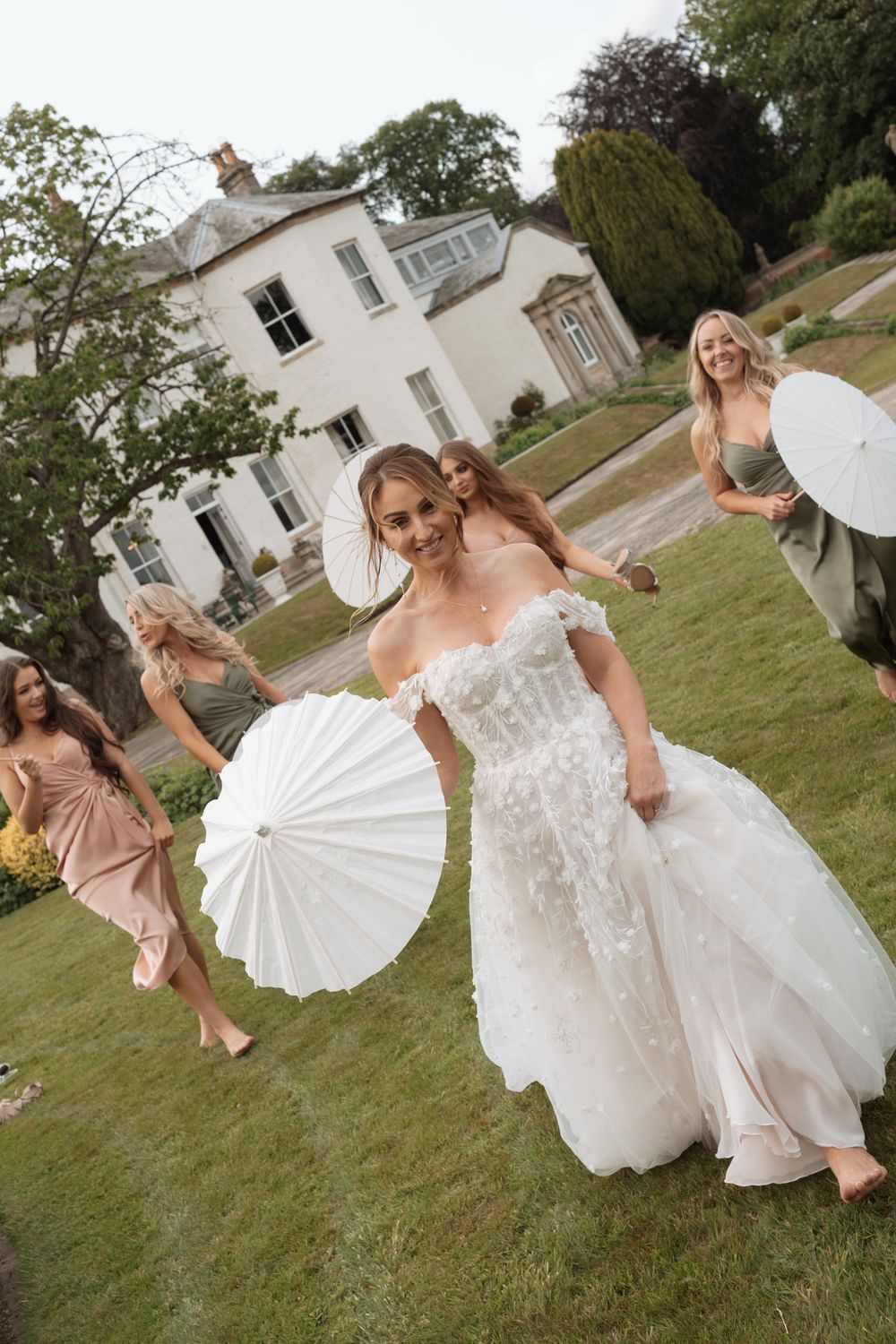 Lartington Hall wedding photographer. Parasol bridesmaid wedding photo