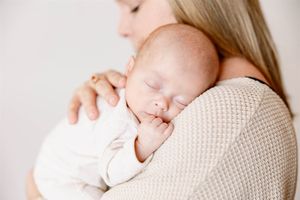 baby in mom's arms