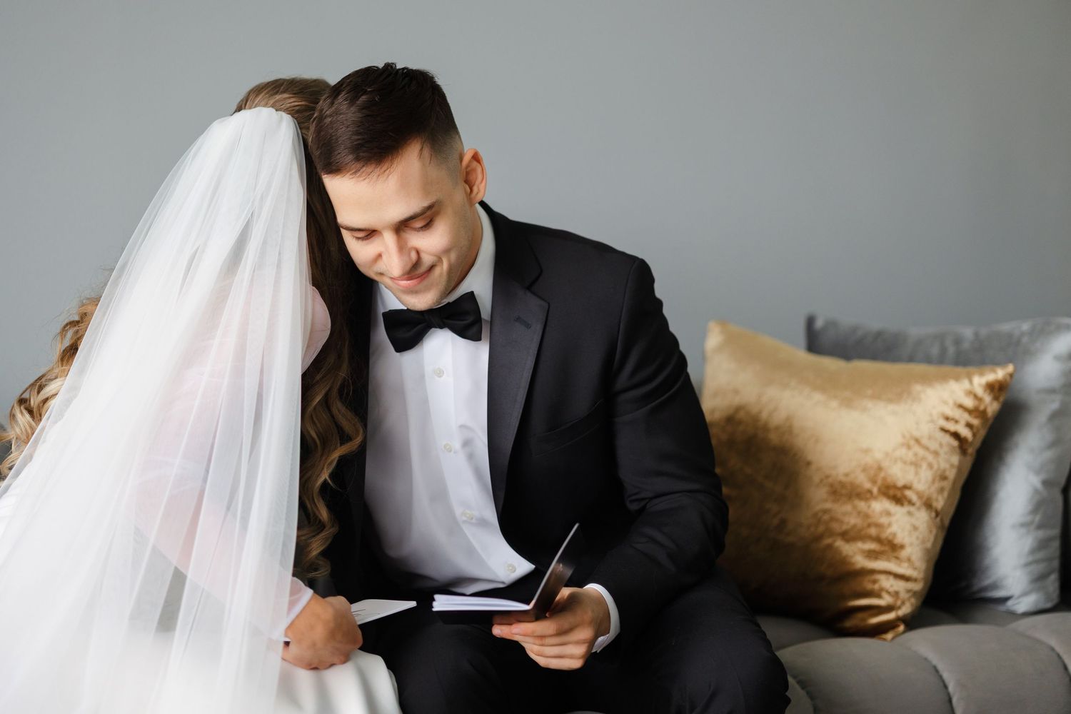 Bride and groom share vows privately and hug photographed by Tom Forrest from Hudson, Ohio.