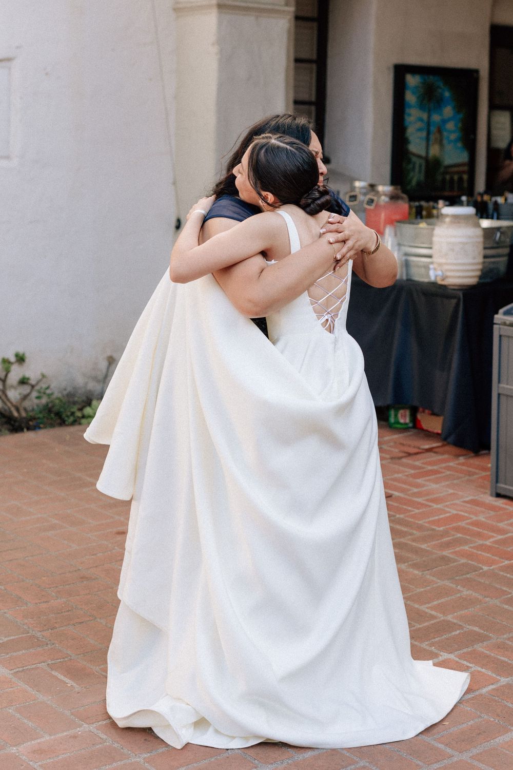 High-energy film image of bride and her Mom dancing emphasizing the fun atmosphere of this non-traditional Santa Barbara wedding party