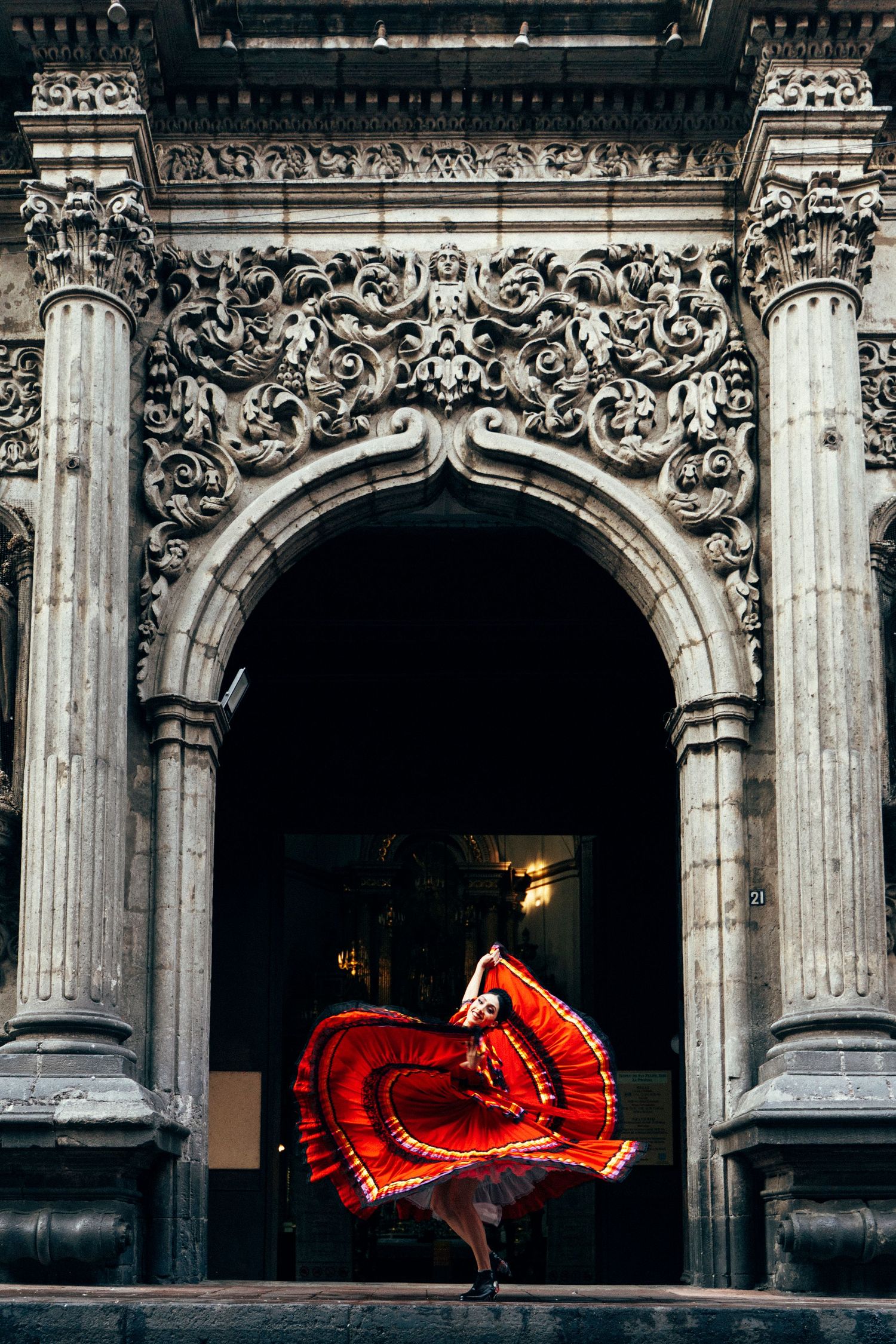 Cultural Ballet Folklórico dance photoshoot on the streets of Mexico City with urban backdrop