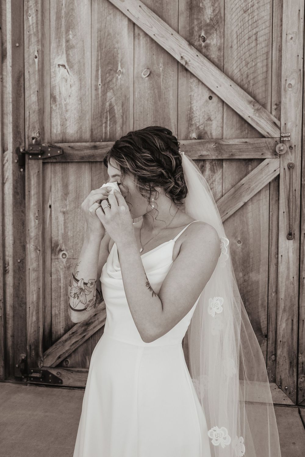 Three vintage-style photographs show a bride in a white dress leaning against a rustic wooden barn wall.