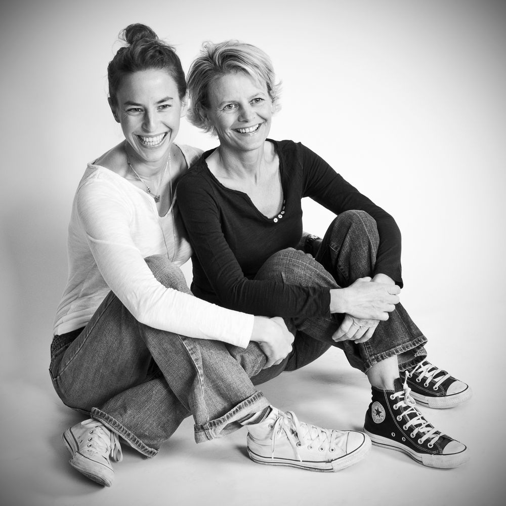 Series of casual black and white portraits showing people sitting together on a white floor.