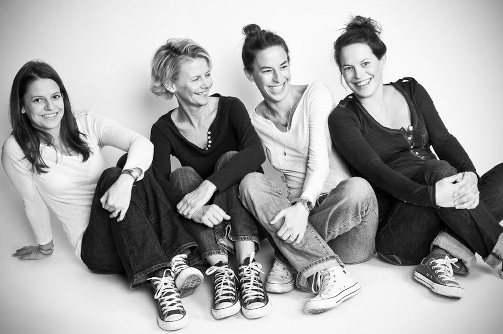Series of casual black and white portraits showing relaxed poses and interactions on white background.
