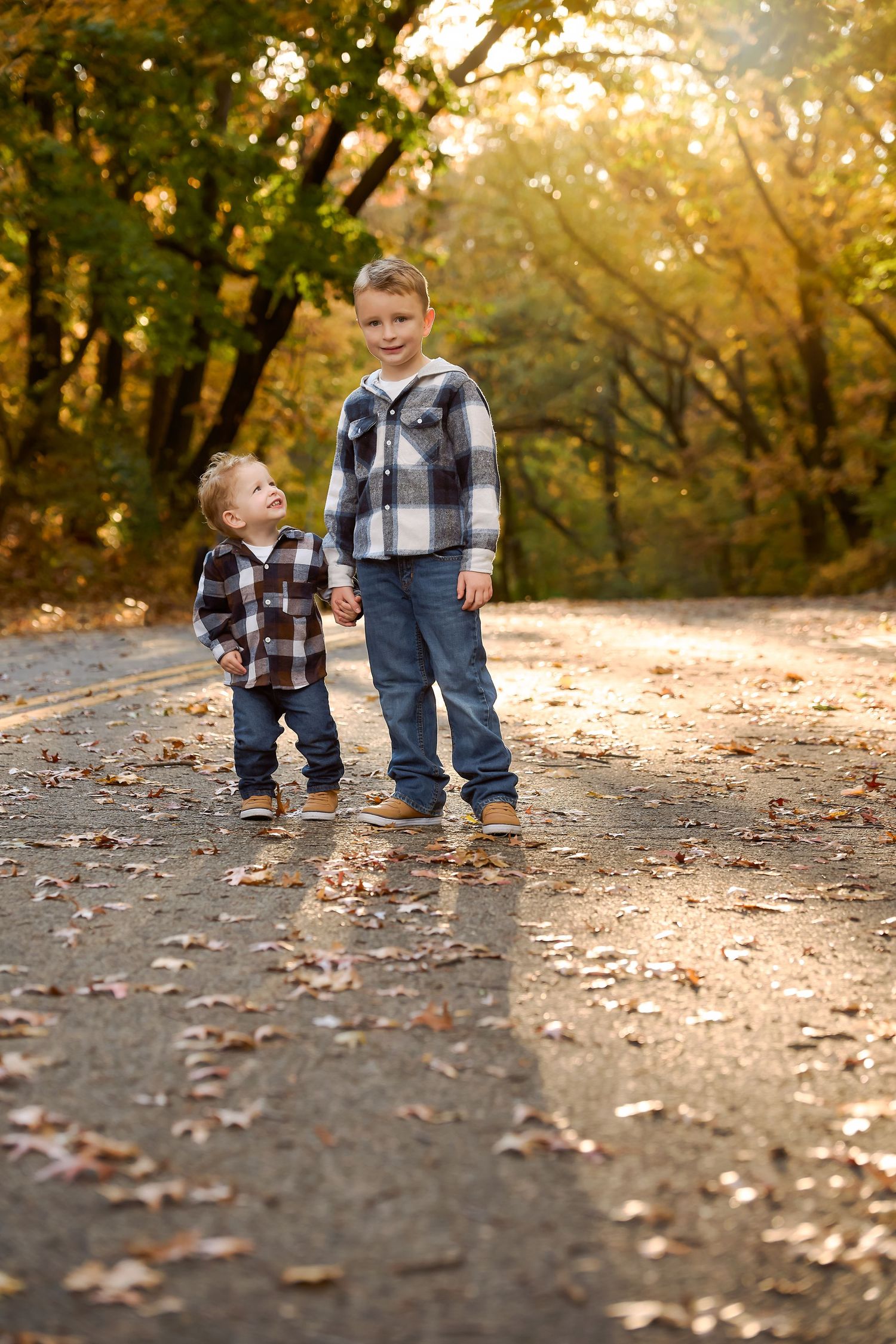 fall family portrait of brothers in queens park