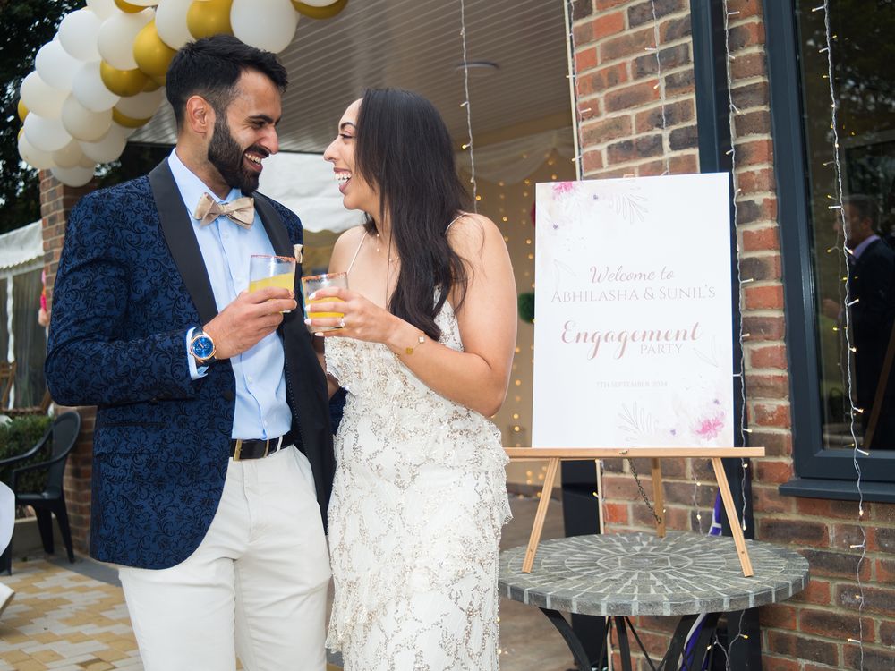 A couple celebrate their engagement, captured by Abigail's studio in High Wycombe