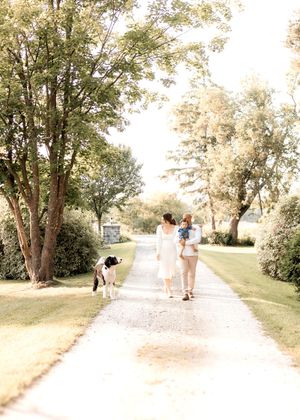 Progressive shots of people walking down a sunny tree-lined path in summer.
