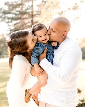 Family photo series showing tender moments and kisses in golden sunlight.