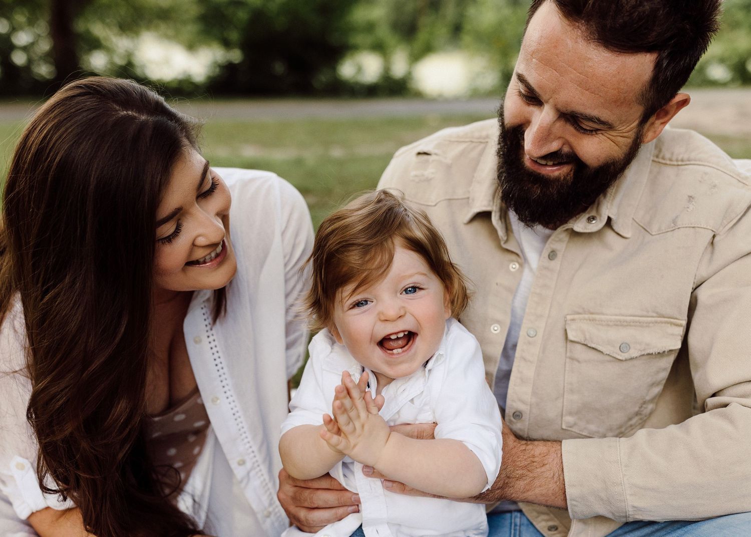 Sweet family moment captured in a series of natural outdoor photos.