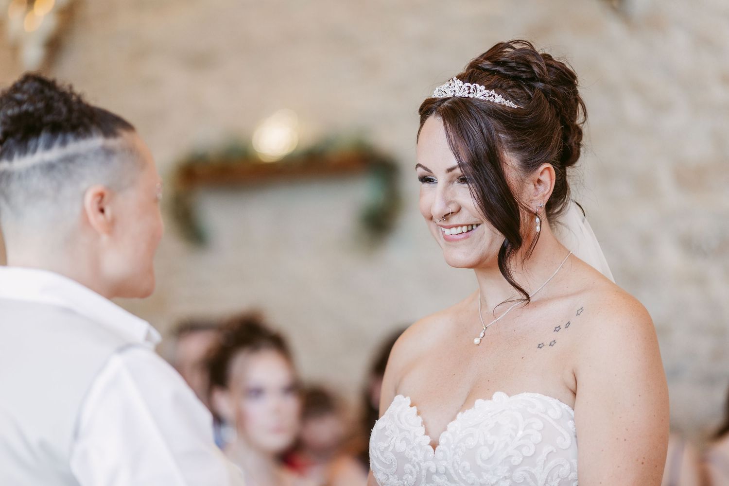 Joyful wedding celebration moments captured during indoor reception.