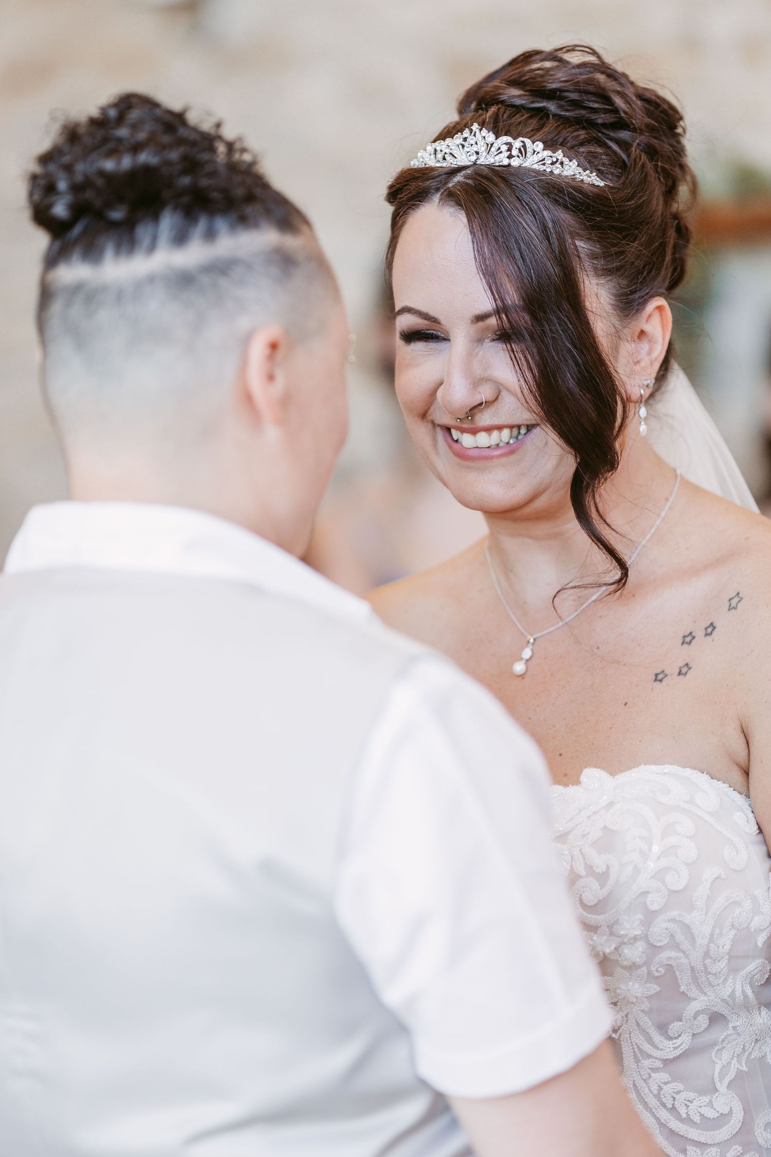 A romantic wedding moment captured in an intimate close-up shot.