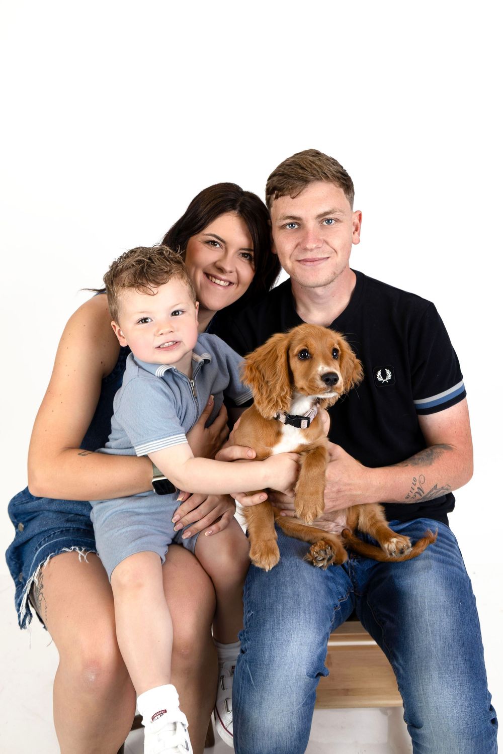 Happy family portrait with parents, young boy, and golden Cocker R.A.M Photography, Stranraer