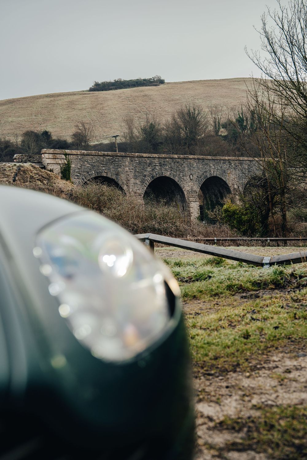 Stone bridge arches in a rural landscape captured from multiple perspectives.