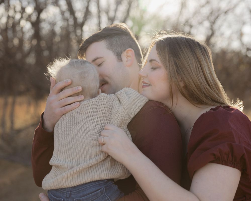 A couple shares tender romantic moments in a series of outdoor sunset photos.