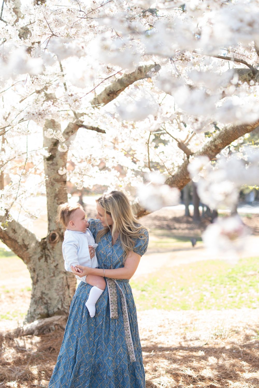 Baby boy during a flowering mini session in Marietta GA with his mom