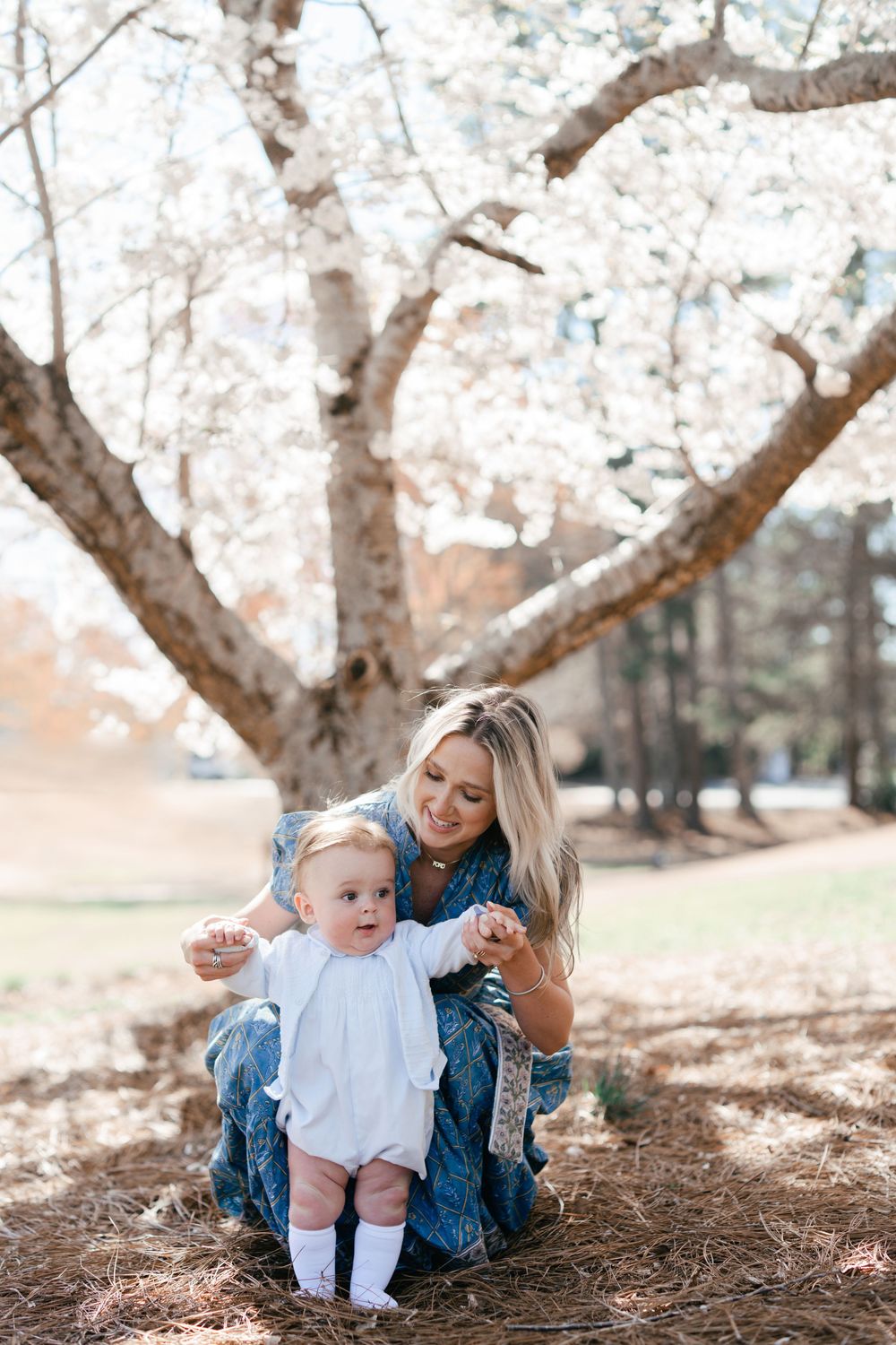 Baby boy during a flowering mini session in Marietta GA with his mom