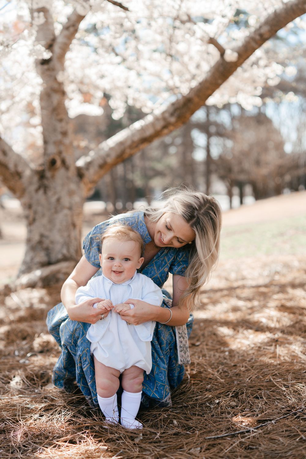 Baby boy during a flowering mini session in Marietta GA with his mom