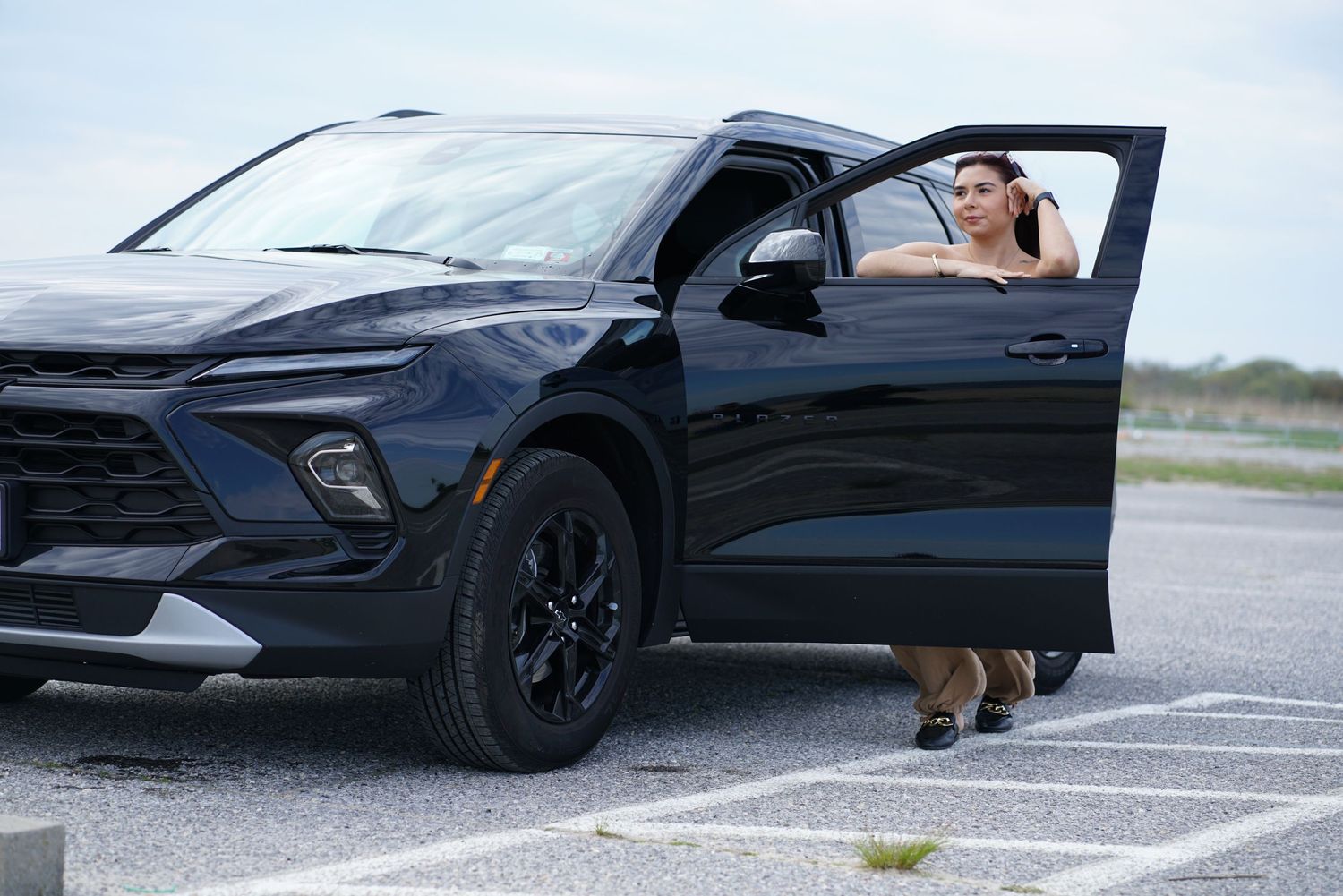 Portrait photoshoot using a car as a prop