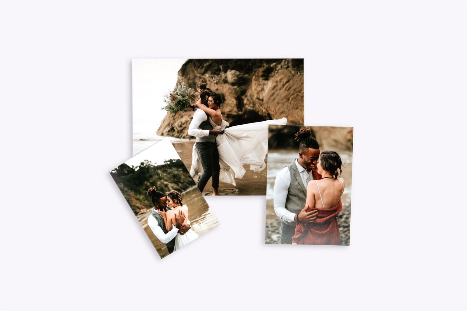 Collection of romantic outdoor wedding photographs scattered in an artistic layout against a light backdrop.