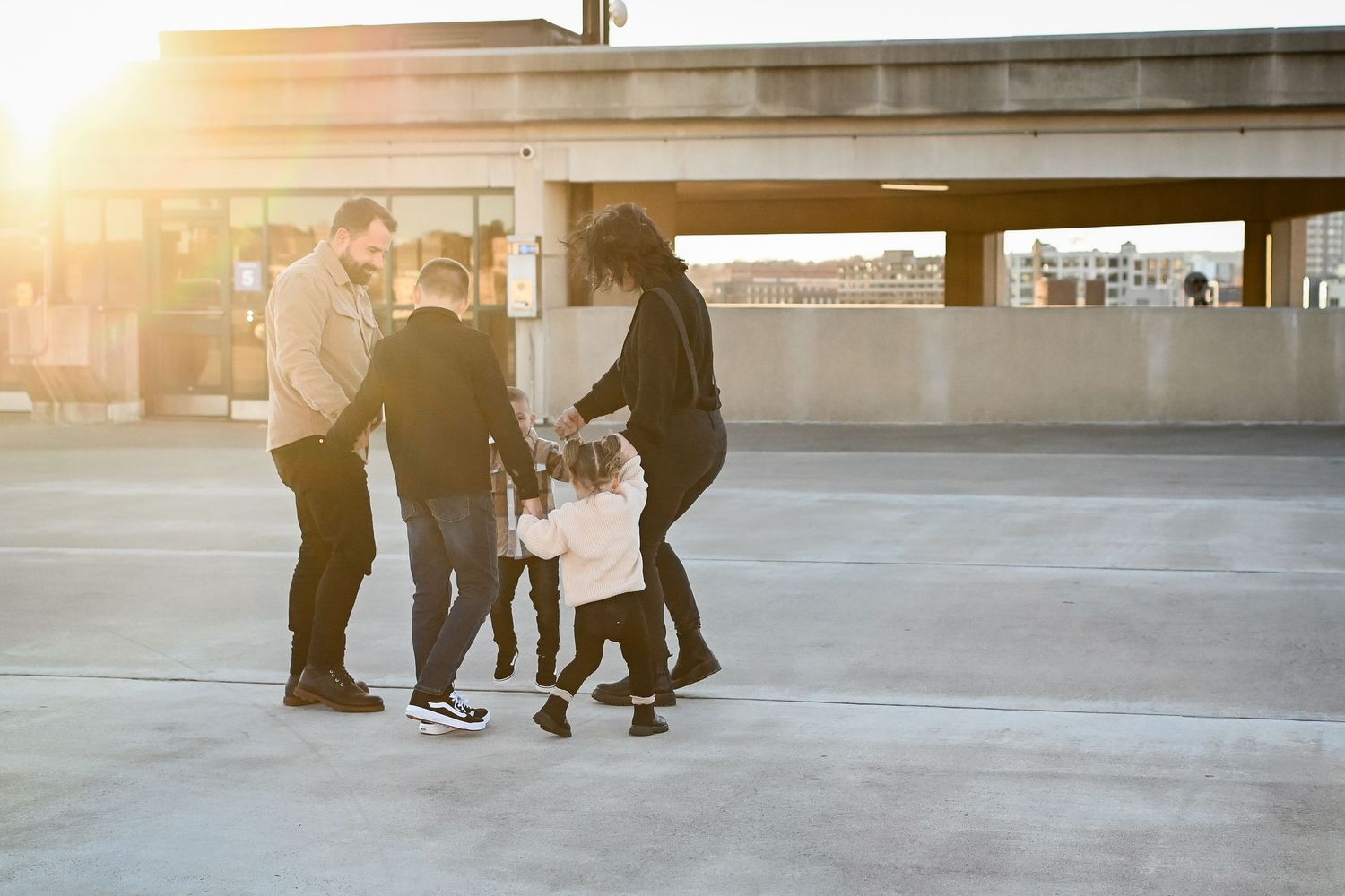 Sturbridge family photography of a family dancing outside