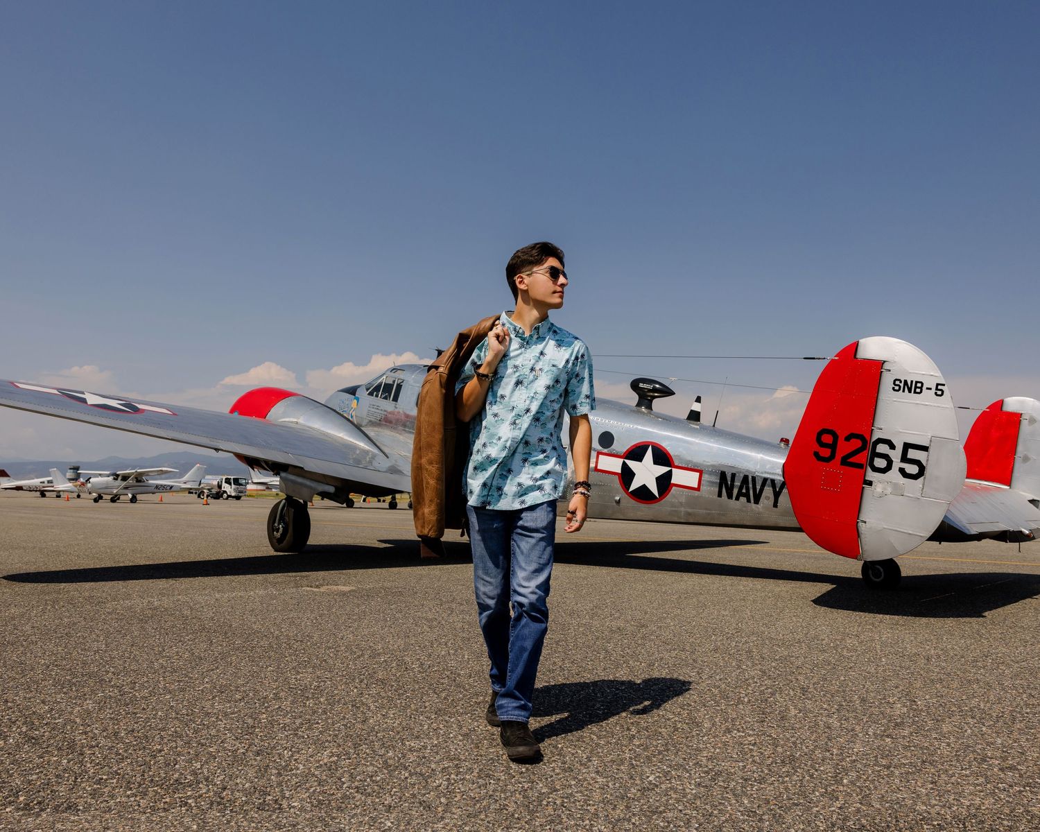 senior boy with airplane, senior portraits, senior session, high school senior Boulder, best high school senior photographer Denver