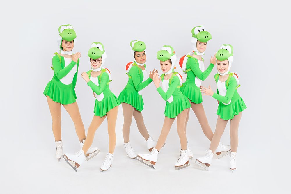 Cheam Skating Club skating group photo, clean white backdrop studio portrait