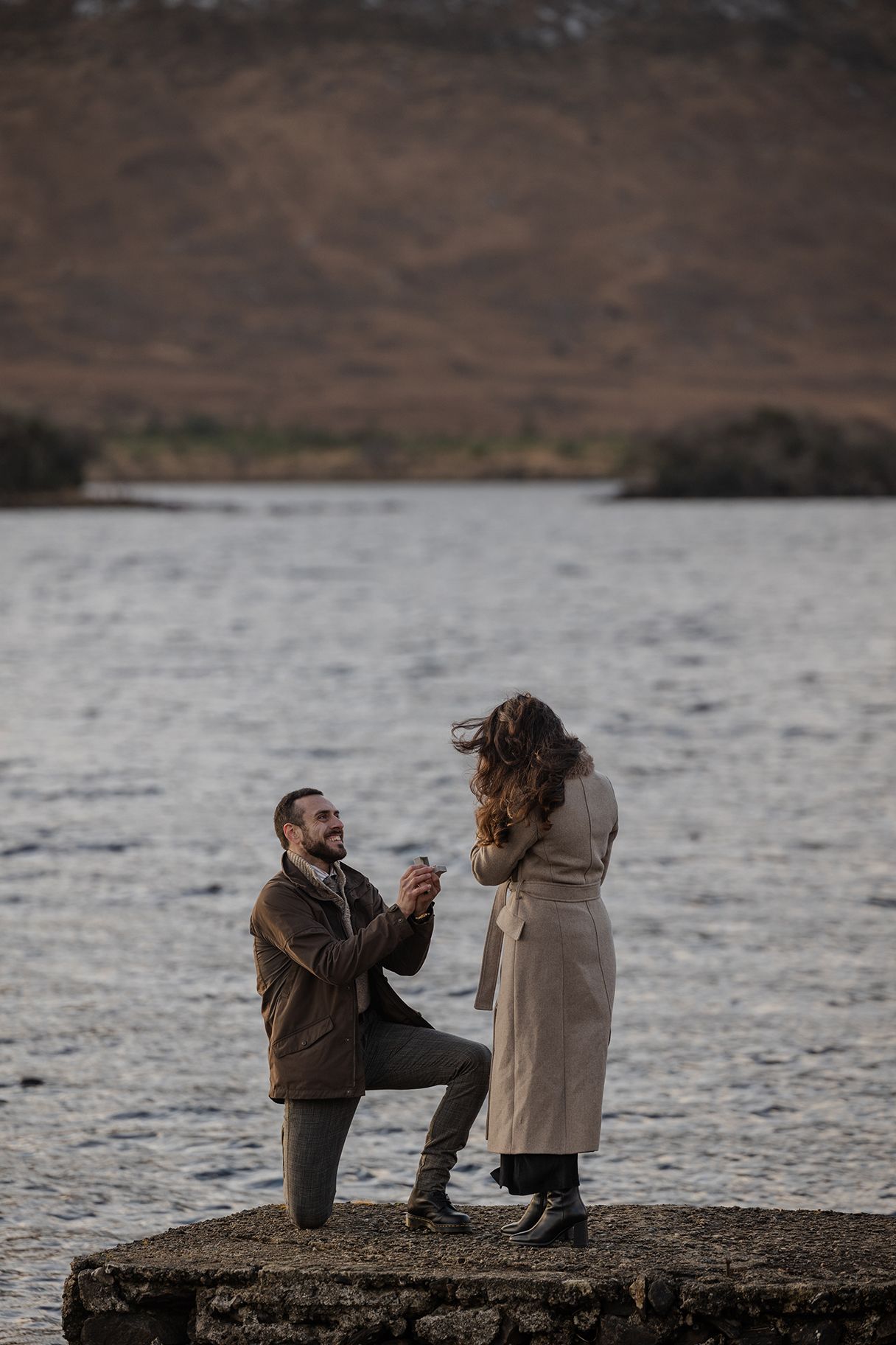Surprise proposal during winter adventure engagement session in Connemara