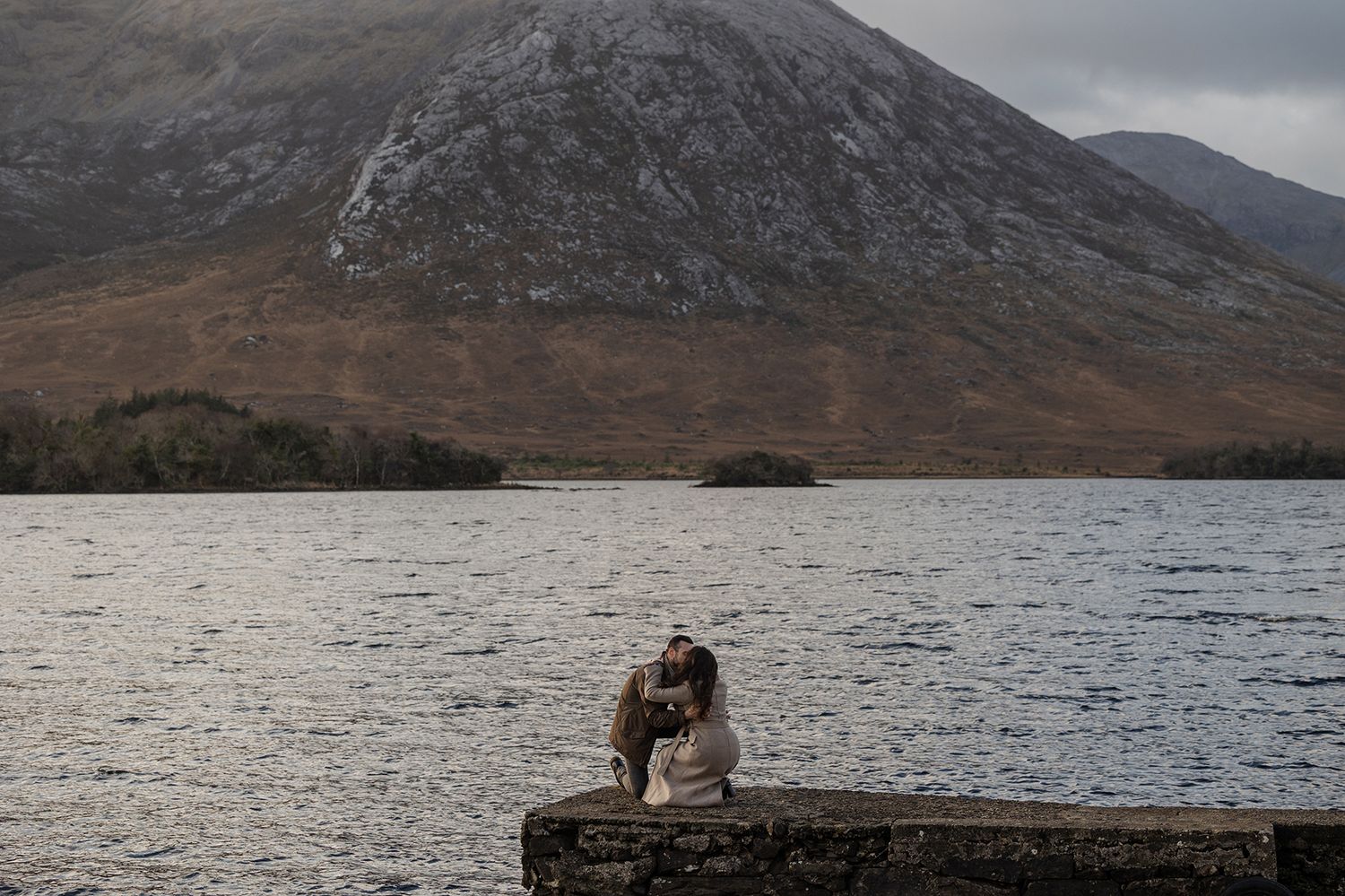 Surprise proposal during winter adventure engagement session in Connemara