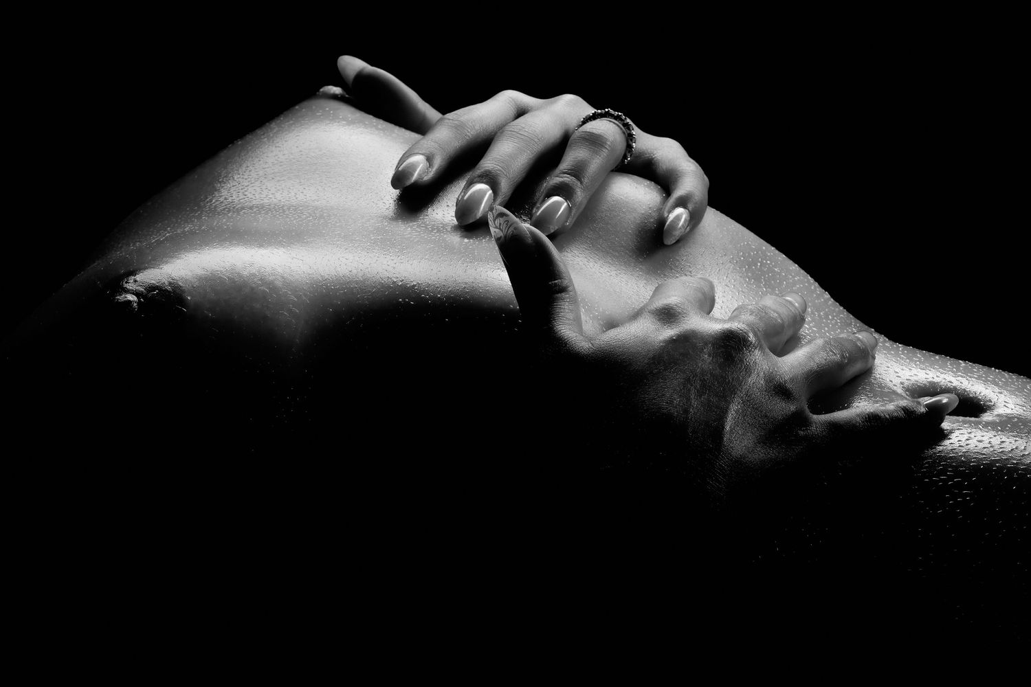 David G Holt Photography - Dramatic black and white silhouette of a dancer in motion against dark background.