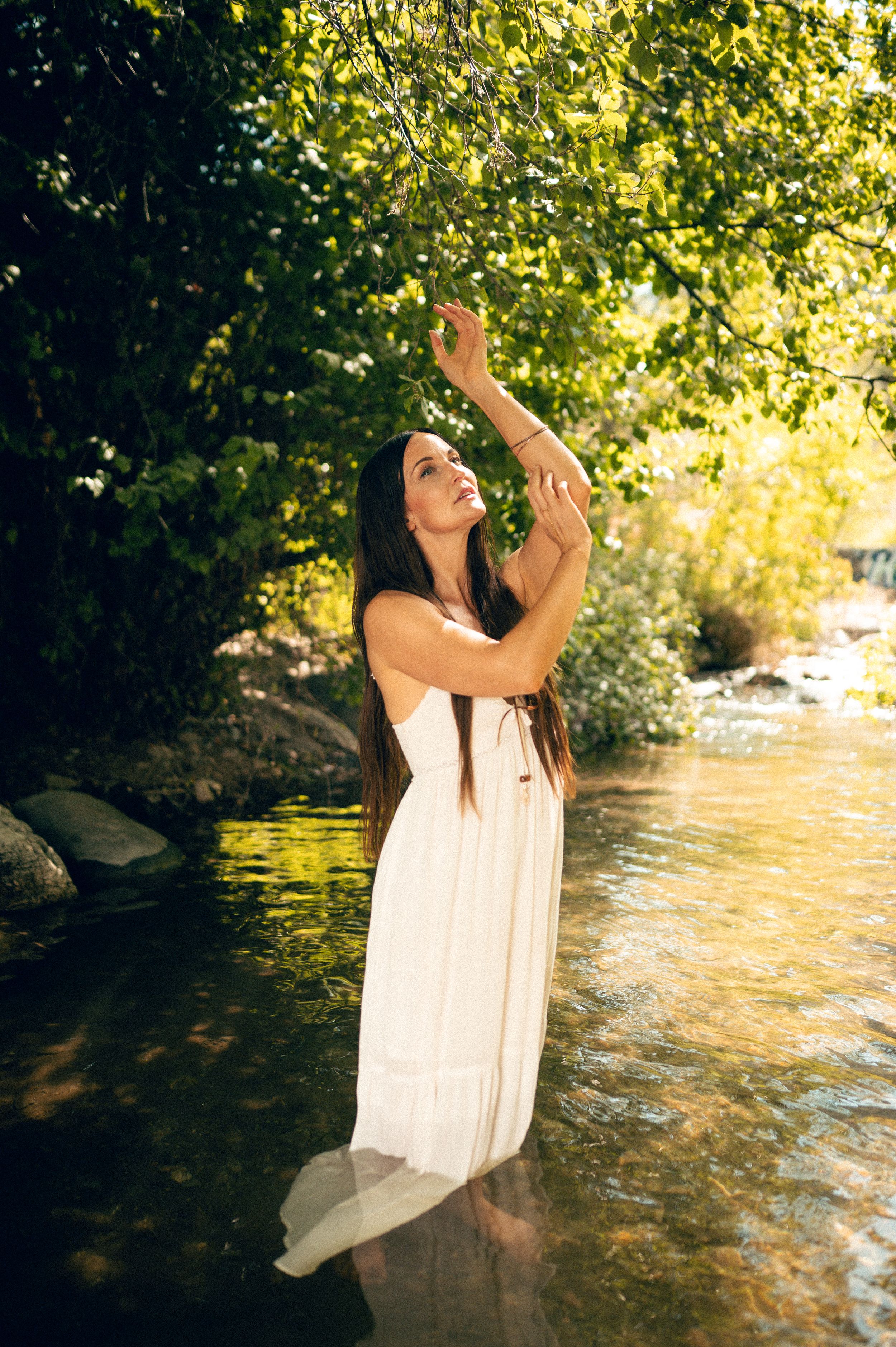 Outdoor Water Boudoir in Utah by Carl James. Unique and creative Boudoir Photography posing in the water.