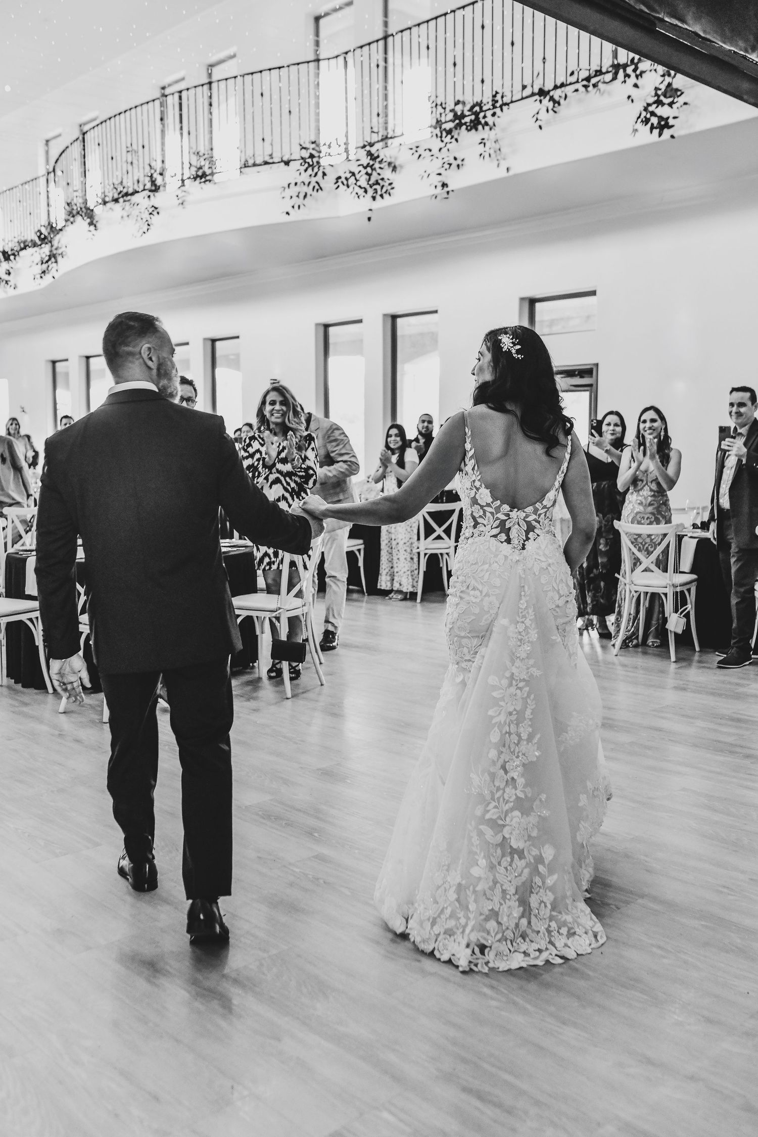 Bride and groom making their grand entrance at vineyard reception