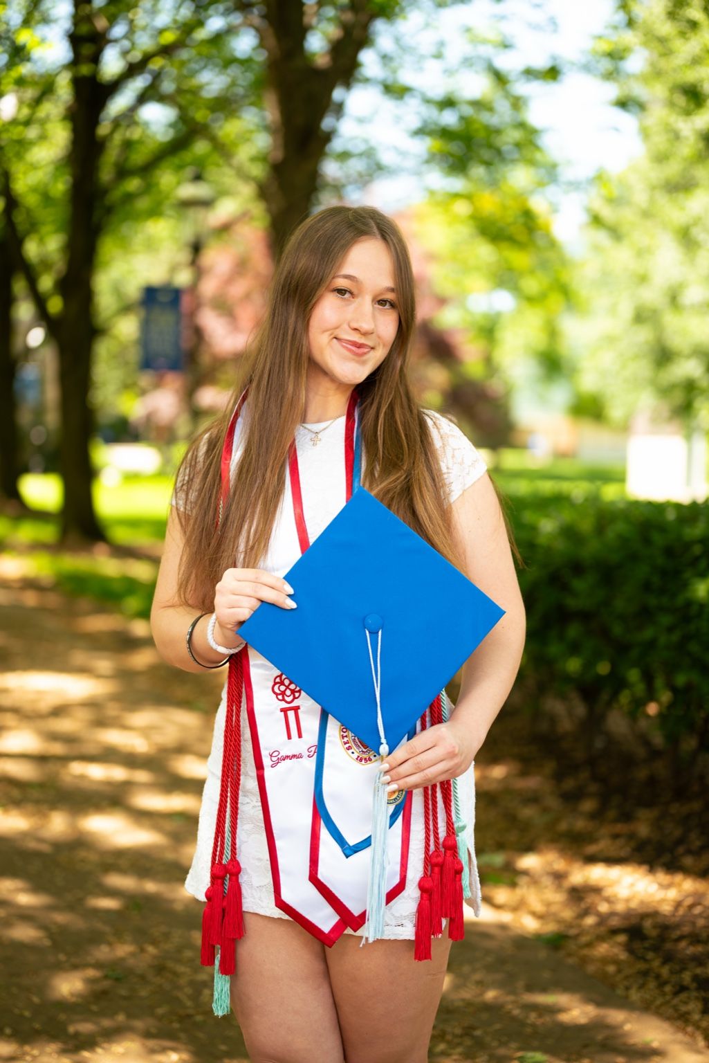 Captured Moments Photography booking prom, graduation, wedding, engagement & event shoots—capturing memorable moments with stunning images.