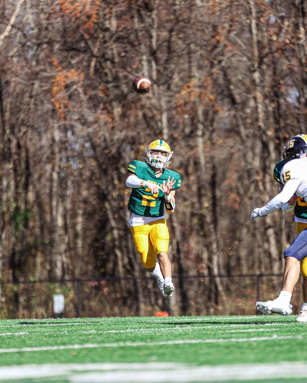 Chris Kaiser throws a pass in first round of 2024 State playoff game