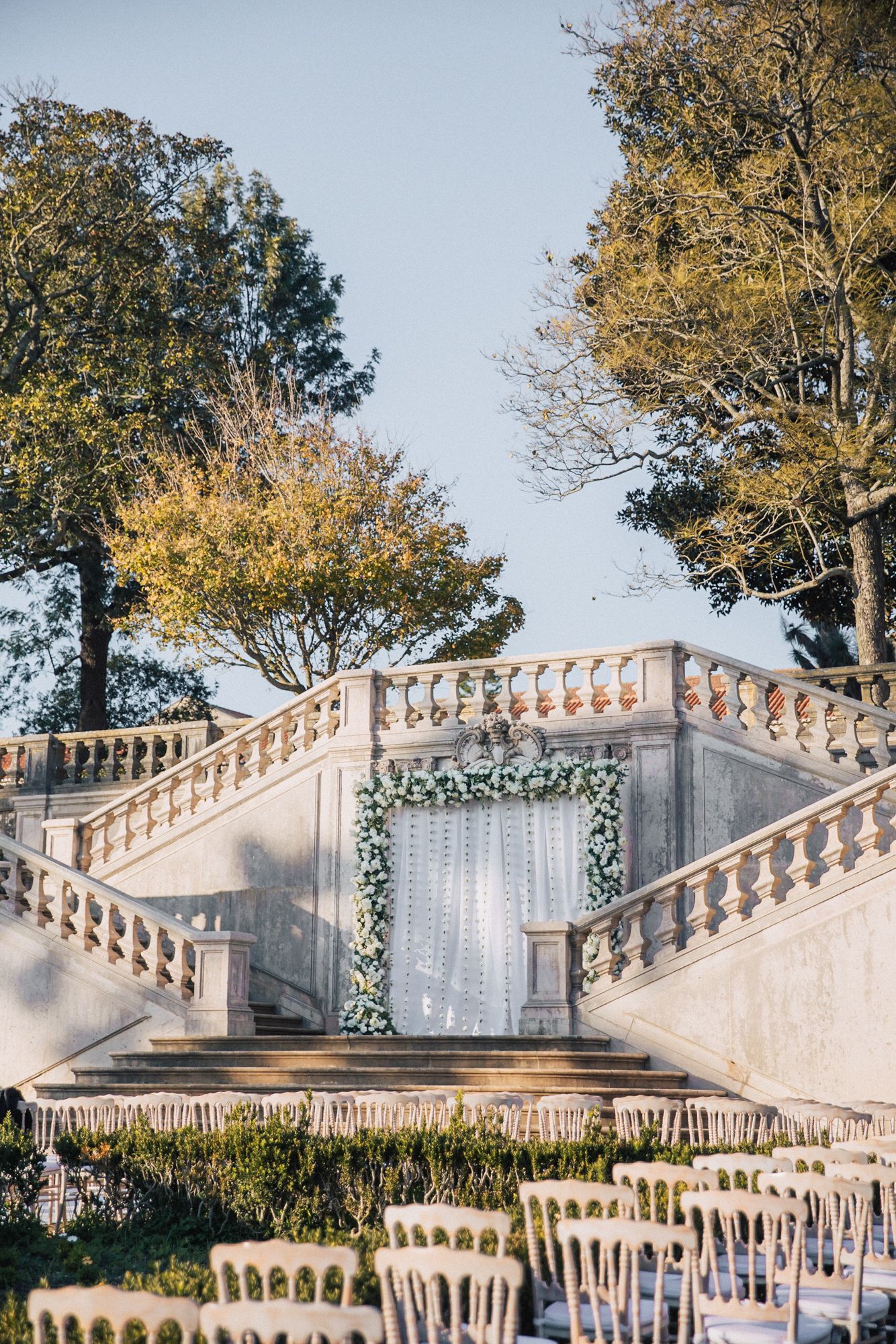 Elegant outdoor wedding ceremony / Mandap at Vandelli lisbon venue. captured by a Portugal destination wedding photographer