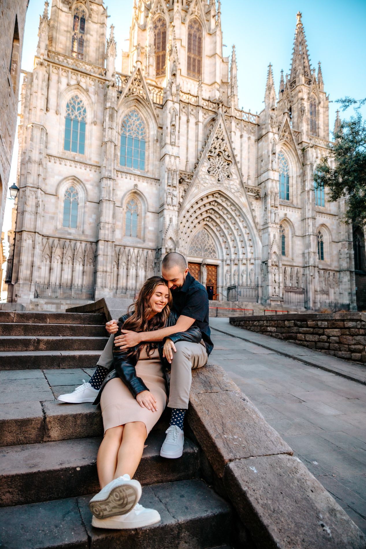 Jared holding Angelina close in a quiet corner of the old city streets.