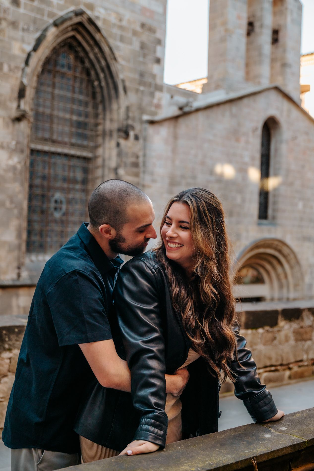 Angelina smiling with the Cathedral spires in the background.