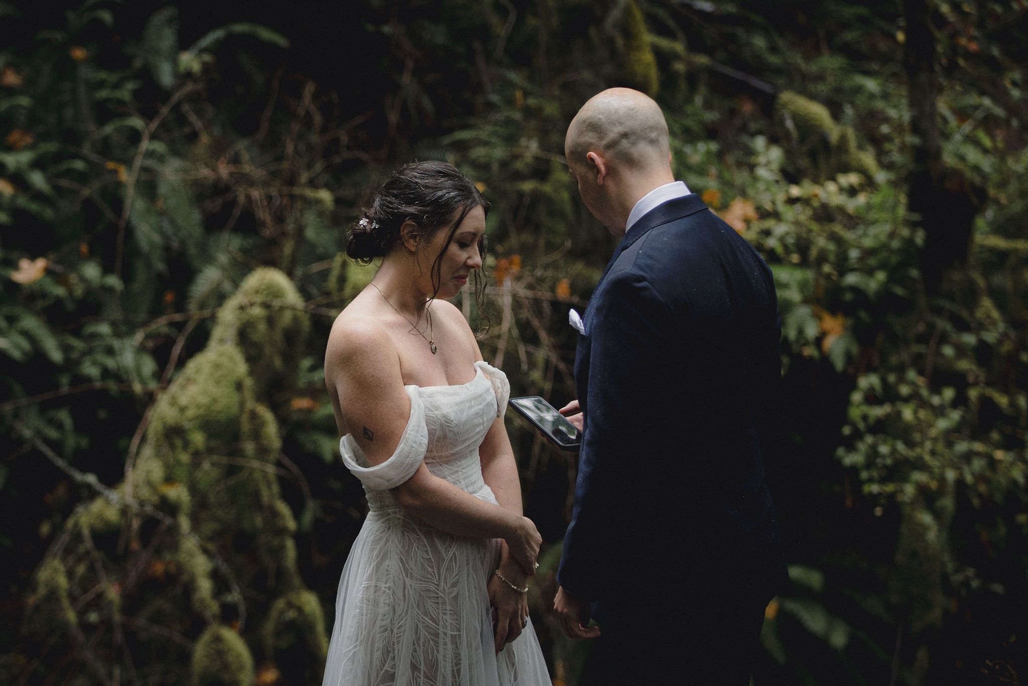 Columbia River Gorge is lush, green and wet, creating moody fairytale vibes for an intimate elopement.