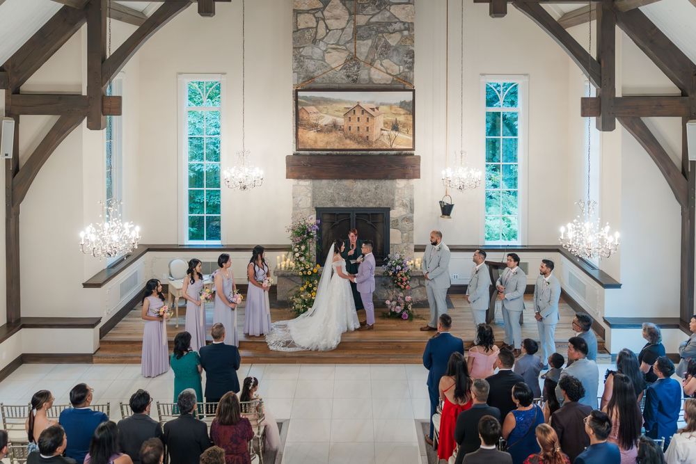 Candid wedding photo of a wedding ceremony in the chapel at the ancaster mill in hamilton, ontario.